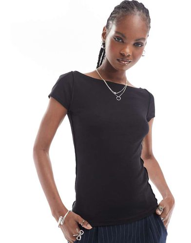 Brita semi-sheer top with slash neck in black - Weekday - Modalova