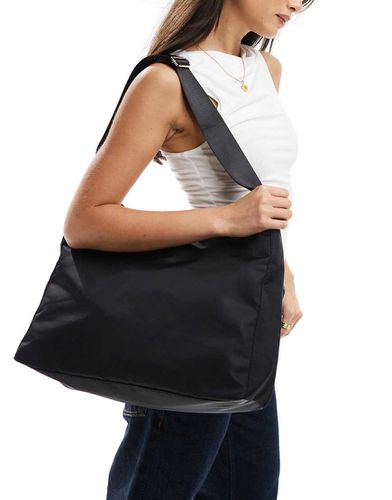 Carry - Borsa da spalla oversize nera - Weekday - Modalova