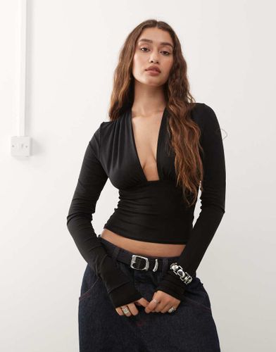 Exclusivité ASOS - Top manches longues à dos nu plongeant - Weekday - Modalova