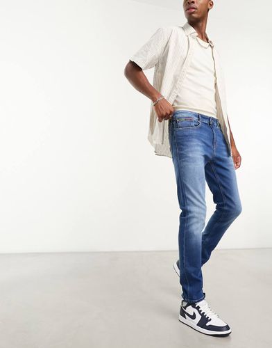 Austin - Jeans slim affusolati lavaggio medio - Tommy Jeans - Modalova