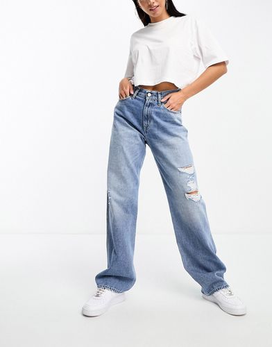 Betsy - Jeans ampi a vita medio alta lavaggio medio con strappi - Tommy Jeans - Modalova