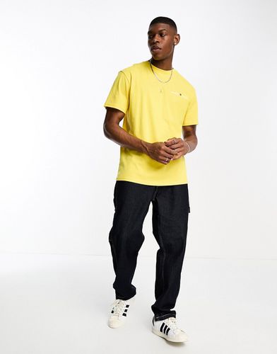 T-shirt gialla con logo lineare classico sul petto - Tommy Jeans - Modalova