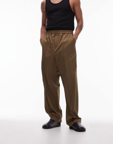 Pantaloni a fondo ampio kaki con vita elasticizzata - Topman - Modalova