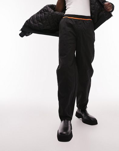 Pantaloni comodi in nylon con elastico arancione fluo in vita - Topman - Modalova