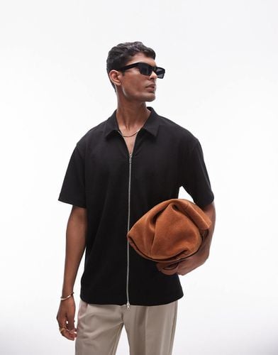 Polo nera oversize in jersey con zip - Topman - Modalova