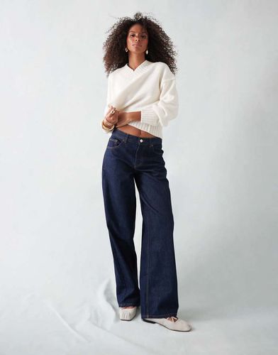 Cinch - Jeans a vita bassa indaco grezzo con cinturino sul retro - Topshop - Modalova