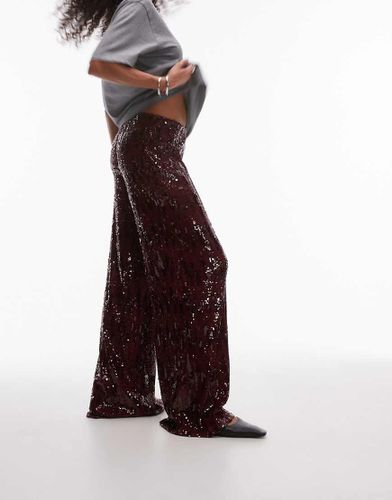 Pantaloni a fondo ampio con paillettes bordeaux - Topshop - Modalova