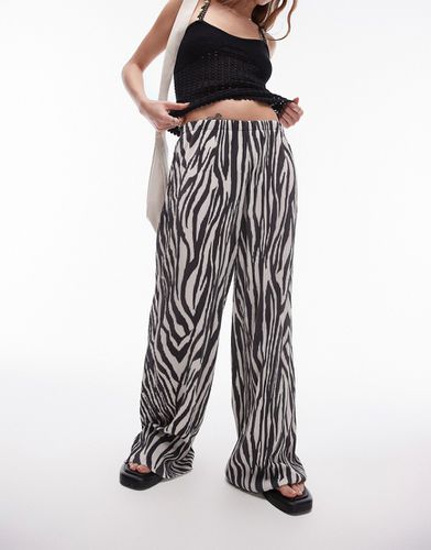 Pantaloni a fondo ampio stropicciati plissé bianchi e neri zebrati - Topshop - Modalova