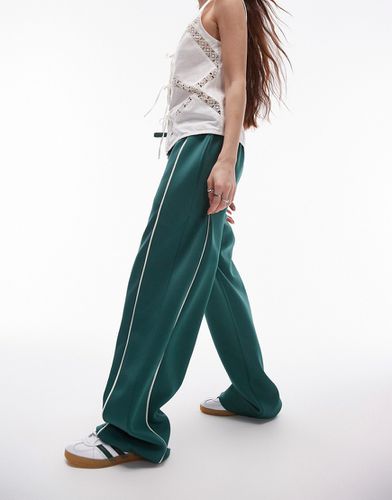 Pantaloni sportivi verdi con fondo ampio - Topshop - Modalova