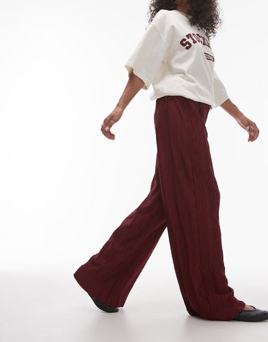 Pantaloni stropicciati plissé a fondo ampio bordeaux - Topshop - Modalova