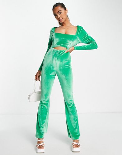 Tuta jumpsuit in velluto smeraldo con cut-out e bustino - The Frolic - Modalova