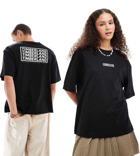 T-shirt oversize nera con logo ripetuto - In esclusiva per ASOS - Timberland - Modalova