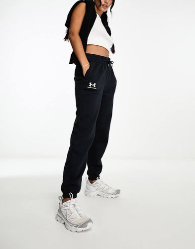 Essential - Joggers in pile neri - Under Armour - Modalova