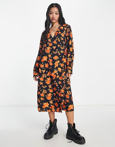 Vestito midi a maniche lunghe arancione a fiori a portafoglio - Vero Moda - Modalova