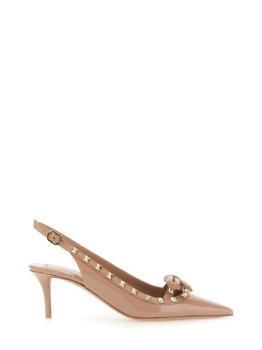 Rockstud bow" slingback pumps - valentino garavani - Modalova