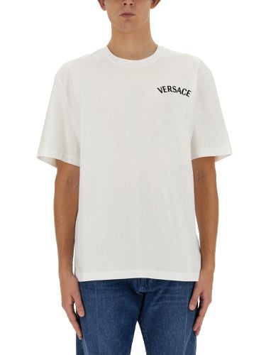 Versace t-shirt with logo - versace - Modalova