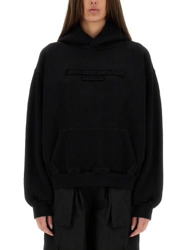 Sweatshirt with embossed logo - alexander wang - Modalova