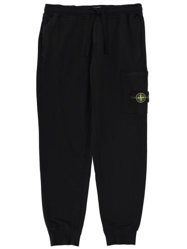 Jogger pants with logo patch - stone island - Modalova