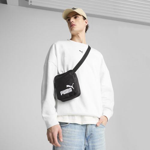 PUMA Phase Portable Bag in Black - PUMA - Modalova