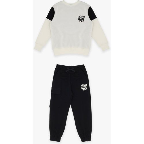 Completo con pullover e joggers con fantasia stampata - Please - Modalova