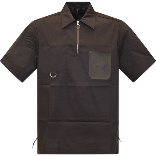 LOW BRAND Polo con tascone e zip - LOW BRAND - Modalova