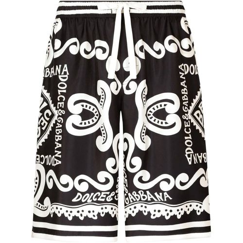 Pantaloncini stampa logo all-over - Dolce & Gabbana - Modalova
