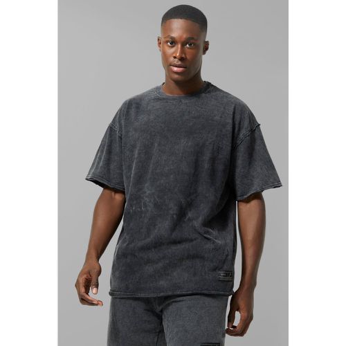 T-shirt oversize Man Active in lavaggio acido grezzo - boohoo - Modalova