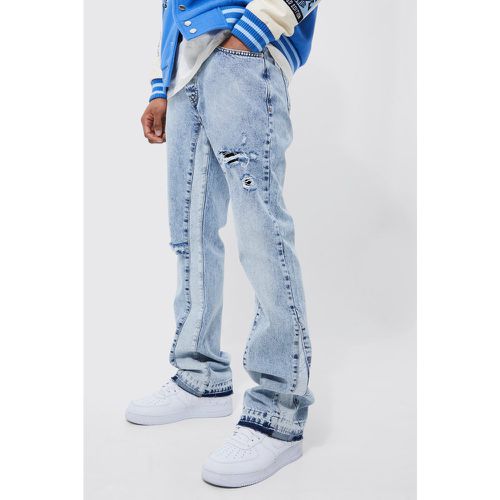Jeans a zampa Slim Fit con pannelli e smagliature - boohoo - Modalova