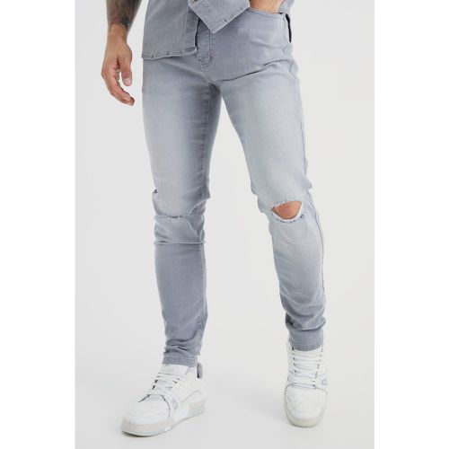 Jeans Skinny Fit con taglio sul ginocchio - boohoo - Modalova