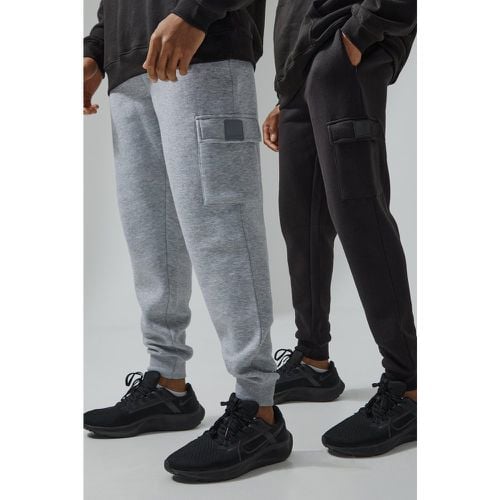 Pantaloni tuta Cargo Man Active Gym - set di 2 paia - boohoo - Modalova