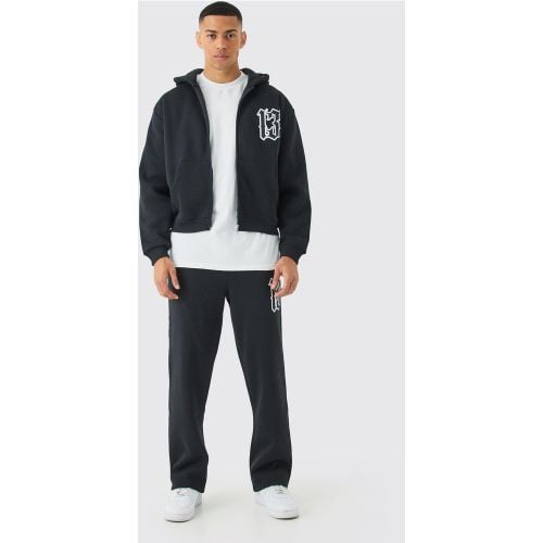 Tuta sportiva squadrata oversize con zip 13 e cappuccio - boohoo - Modalova