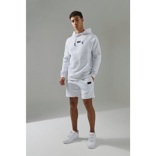 Tuta sportiva Man Active con cappuccio & pantaloncini - boohoo - Modalova