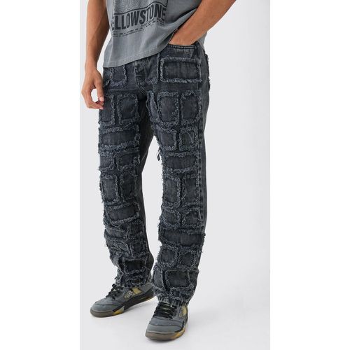Jeans rilassati in denim rigido effetto smagliato effetto patchwork in slavato - boohoo - Modalova