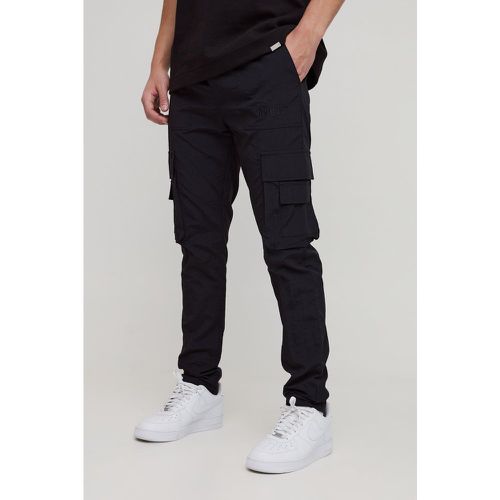 Pantaloni Cargo Slim Fit in nylon con ricami ABODE - boohoo - Modalova