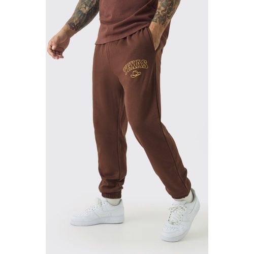 Pantaloni tuta Regular Fit con stampa Texas e polsini alle caviglie - boohoo - Modalova