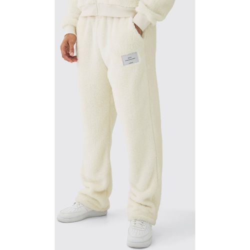 Pantaloni tuta dritti Limited Edition in pile borg Teddy - boohoo - Modalova