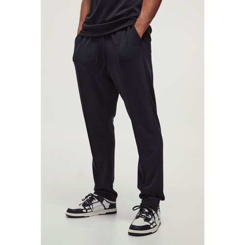 Pantaloni tuta Slim Fit con nervature morbide e nervature - boohoo - Modalova