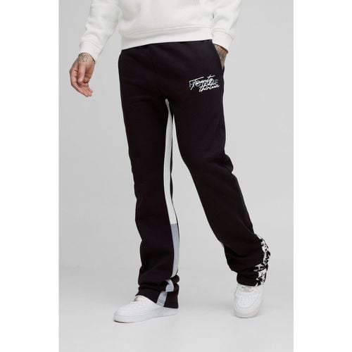 Pantaloni tuta Tall Slim Fit con inserti a zampa, stampa a stelle e pieghe sul fondo - boohoo - Modalova