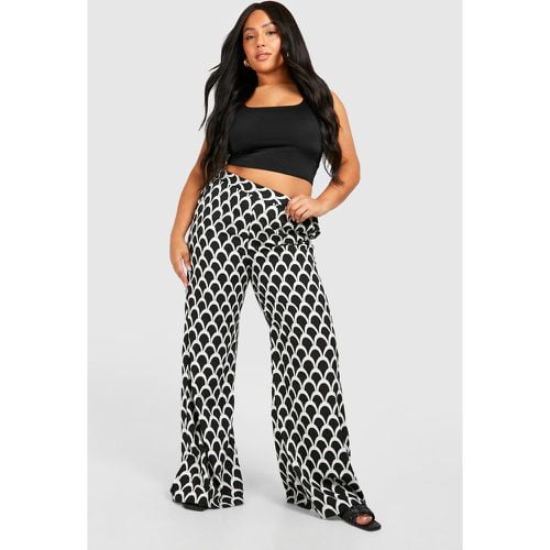 Pantaloni a gamba ampia Plus Size con stampa di motivi geometrici - boohoo - Modalova