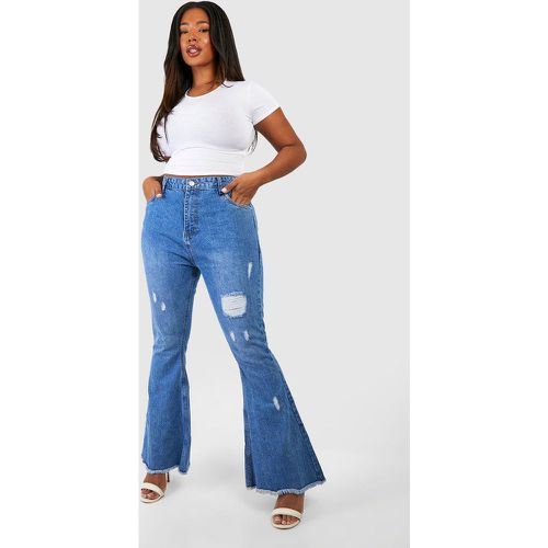 Jeans a zampa Plus Size effetto smagliato - boohoo - Modalova