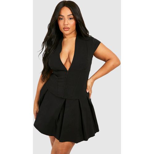 Top a corsetto Plus Size con maniche ad aletta e asole - boohoo - Modalova