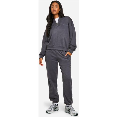 Tuta sportiva Tall con zip corta e cuciture - boohoo - Modalova