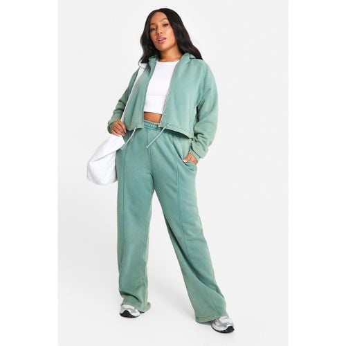 Tuta sportiva Plus Size squadrata slavata con zip e cappuccio - boohoo - Modalova