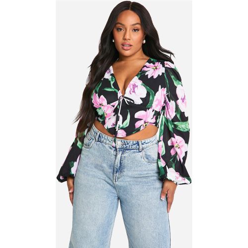 Top a corsetto lungo Plus Size a fiori grandi con maniche a sbuffo - boohoo - Modalova