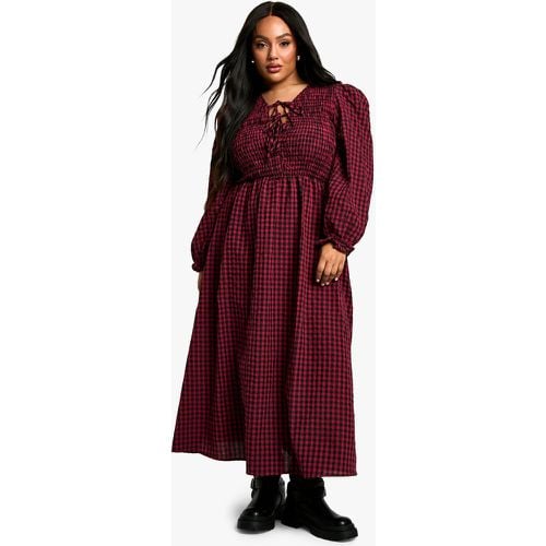 Vestito grembiule Plus Size a quadri con laccetti frontali - boohoo - Modalova