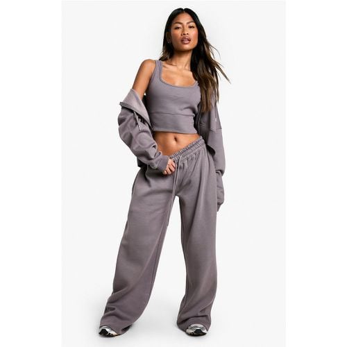 Tuta sportiva in 3 pezzi crop top con fondo profondo e cappuccio - boohoo - Modalova