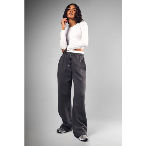 Pantaloni tuta Tall a gamba ampia con laccetti - boohoo - Modalova