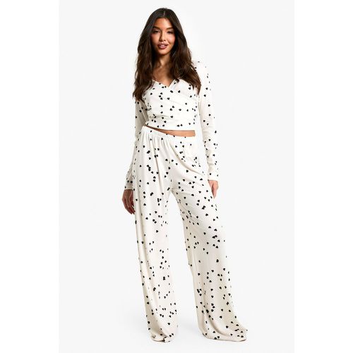 Set pigiama con top a incrocio con stampa a cuori & pantaloni - boohoo - Modalova