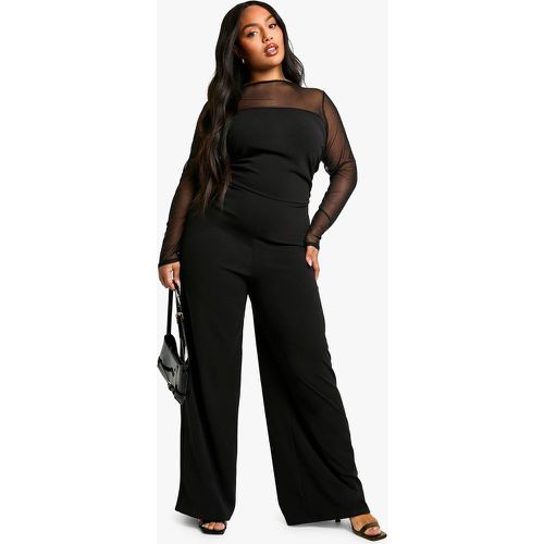 Tuta intera Plus Size a gamba ampia in rete con ruches - boohoo - Modalova