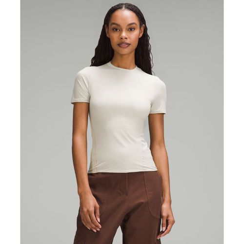– Wundermost Hüftlanges Kurzarmshirt mit Rundhalsausschnitt aus Ultra-Soft Nulu für Frauen – Größe XL - lululemon - Modalova